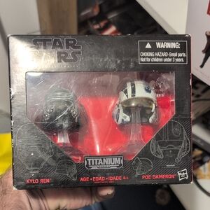 Star Wars Titanium Series Kylo Ren and Poe Dameron Helmets